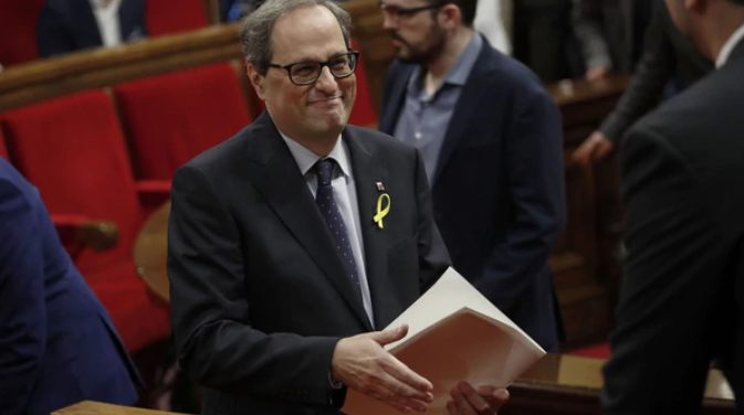 El nuevo presidente catalán nombró como consejeros a dos encarcelados y dos huidos de la Justicia española
