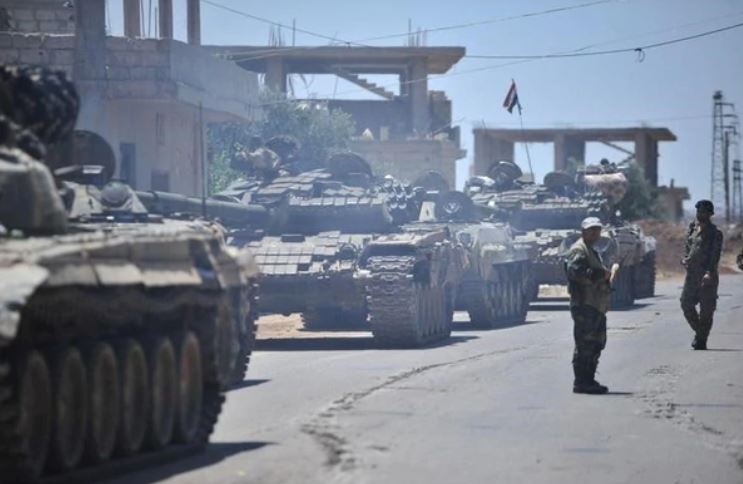 Los rebeldes y sus familias abandonan el sur de Siria ante el avance de las tropas de Al Assad